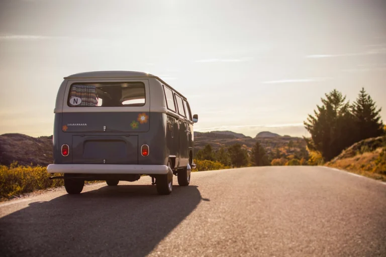 A camper van entering high way representing the start of van life